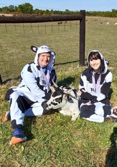 Ryan, Angel (cow), and Elizabeth at Iowa Farm Sanctuary